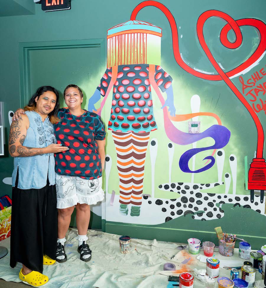 Live painting of "Queer" mural at Selina hotel by DC muralist Ashley Jaye Williams in 2023 | Photo by Ben Droz